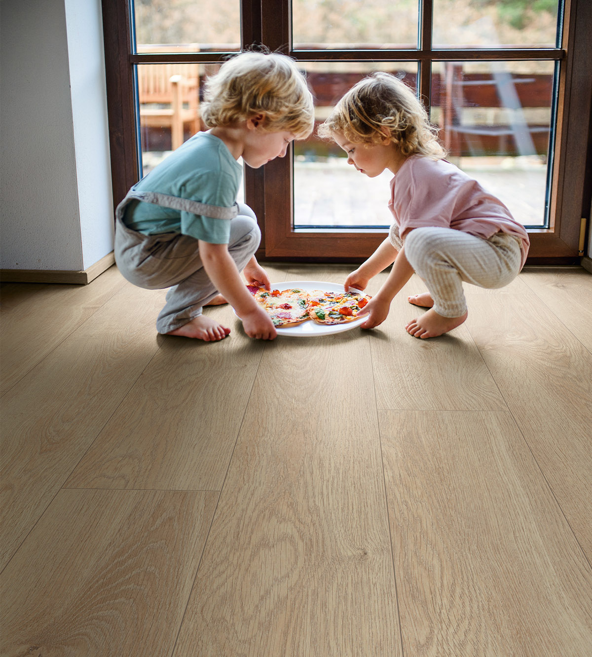 Organic Classic Eurus Oak laminate – child-friendly oak flooring shown in action with kids and food moments