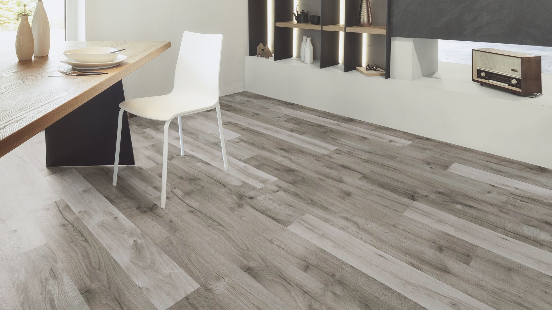 Light room setting enhanced by the O523 Oak Naverina laminate flooring, its natural tones adding an inviting warmth to the space.