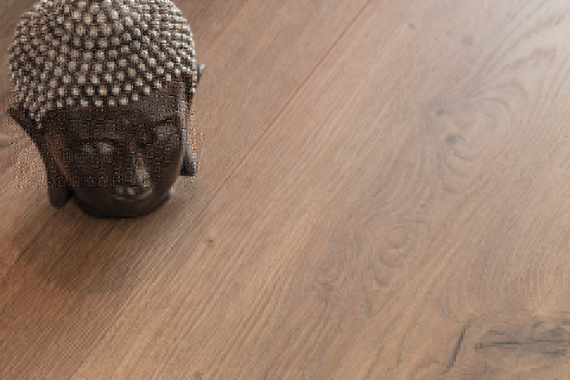 Close-up artistic view of K34242 Oak Orlando Laminate Flooring, displaying the vibrant grain patterns and rich, warm oak tones.