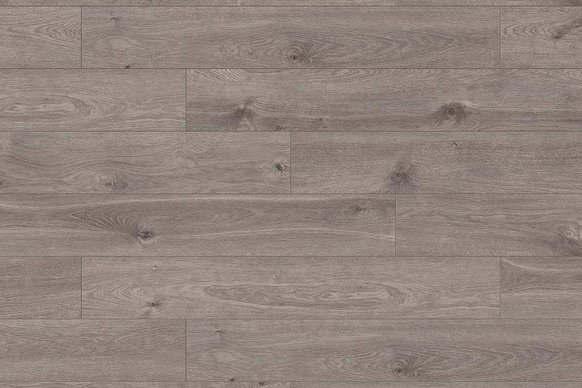 Top-down close-up of K395 Tornado Oak laminate flooring – dark tones with bold, natural oak grain texture