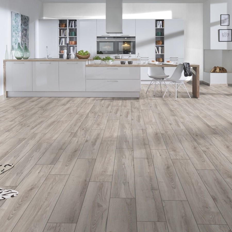 Image of a kitchen, elegantly uplifted by the rich, oak-textured Laminate Flooring K418 Longbow Oak.