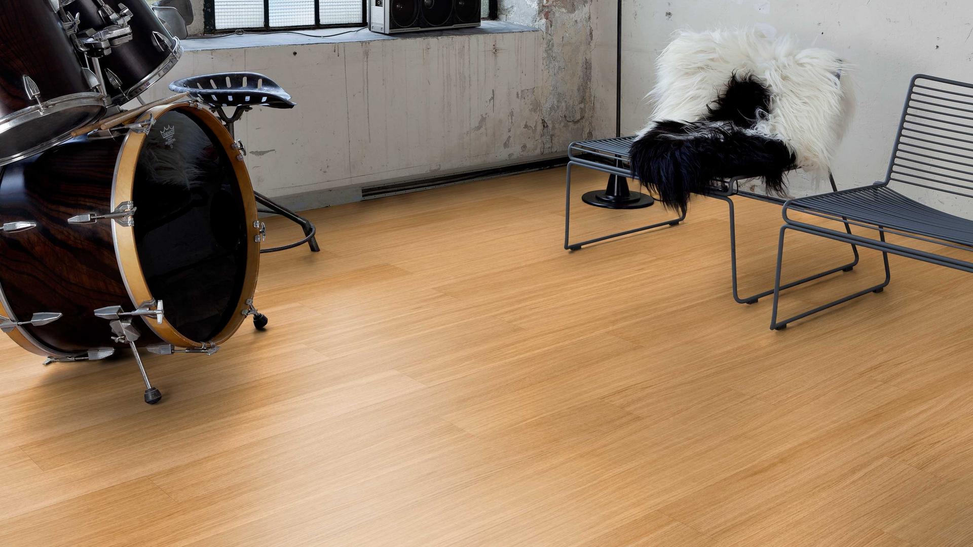 EIPU Oak Noble Pure real wood flooring creating contrast in a modern rock studio environment