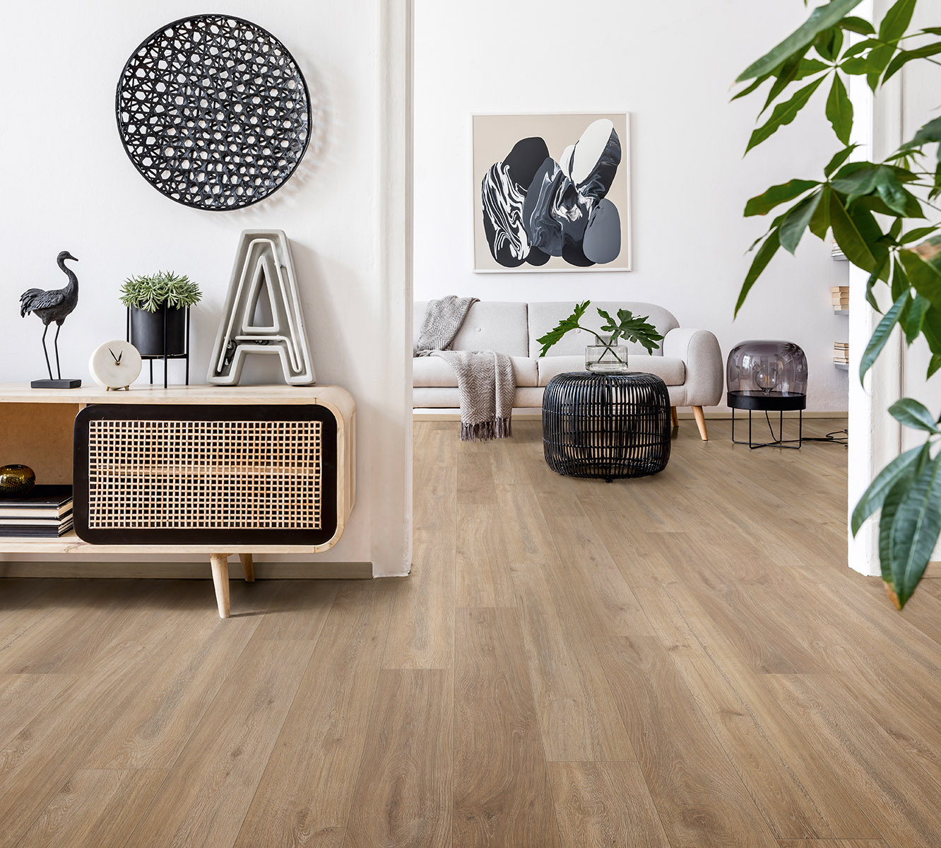 Khaki Oak laminate flooring in stylish living room with retro-modern design – warm oak tones balancing old and new