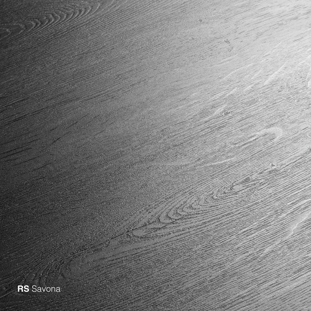 a Savona photo of a wood floor in black and white.