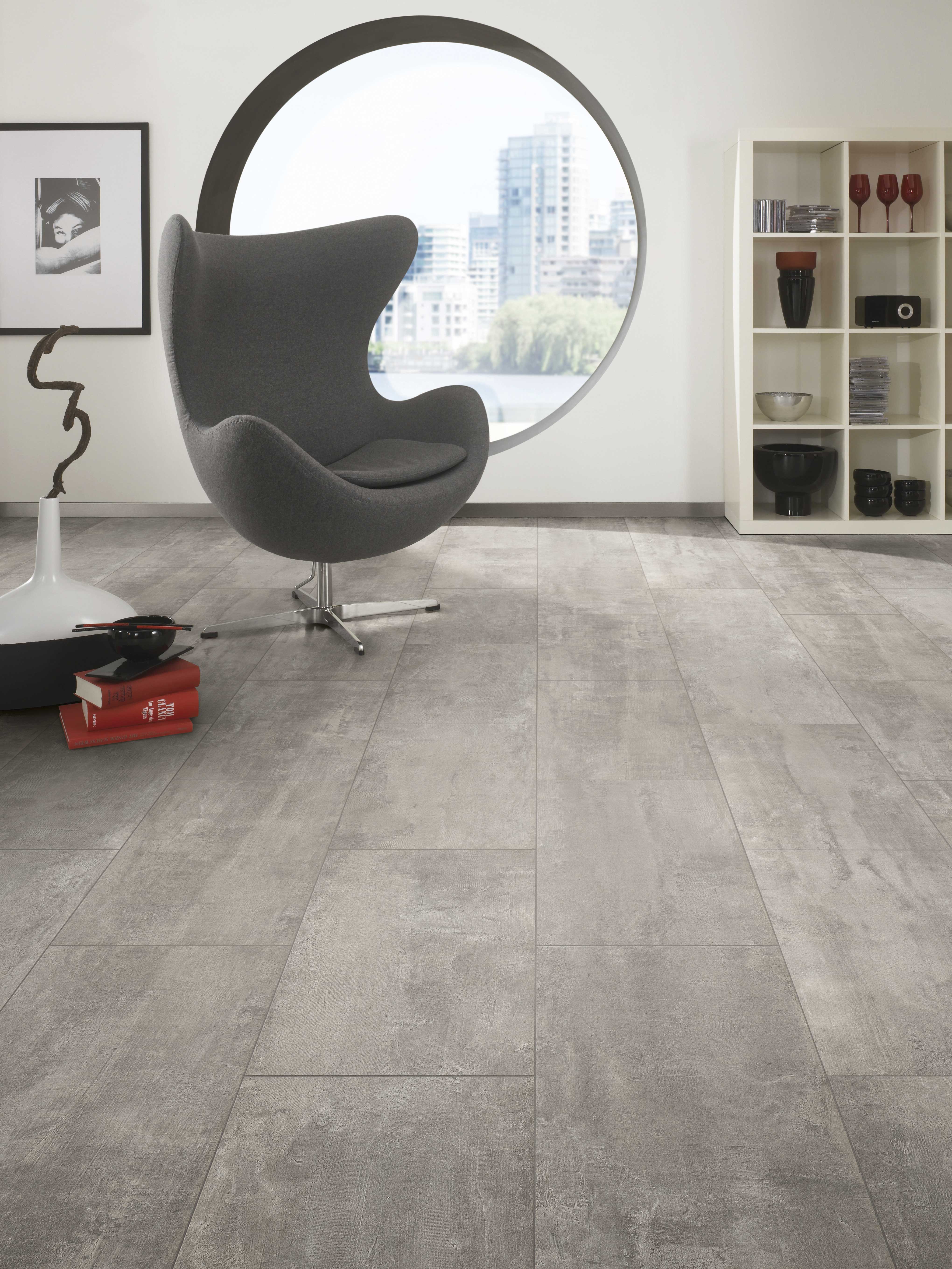 Modern office with Crosstown Traffic laminate flooring – stone-look surface perfect for high-traffic workspaces"