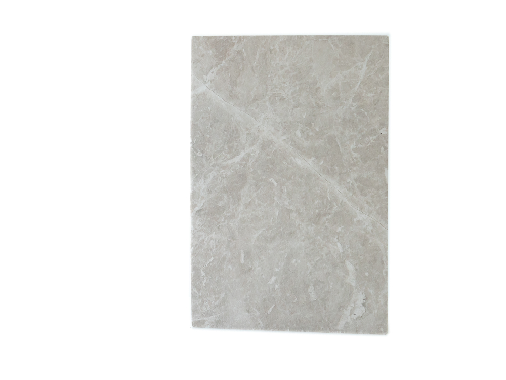 Close-up of K367 Cream Navona PH, showing intricate cream patterns.