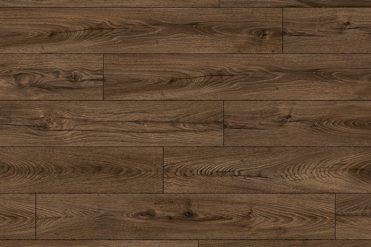 Close-up of K479 Espresso Carpenter Oak laminate flooring from Atlantic 10 collection – rich espresso tones with authentic wood grain texture