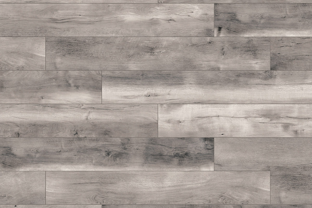 Close-up of K413 Blackwater Oak laminate flooring with deep tones and distinctive authentic embossed wood texture from Atlantic 10 collection