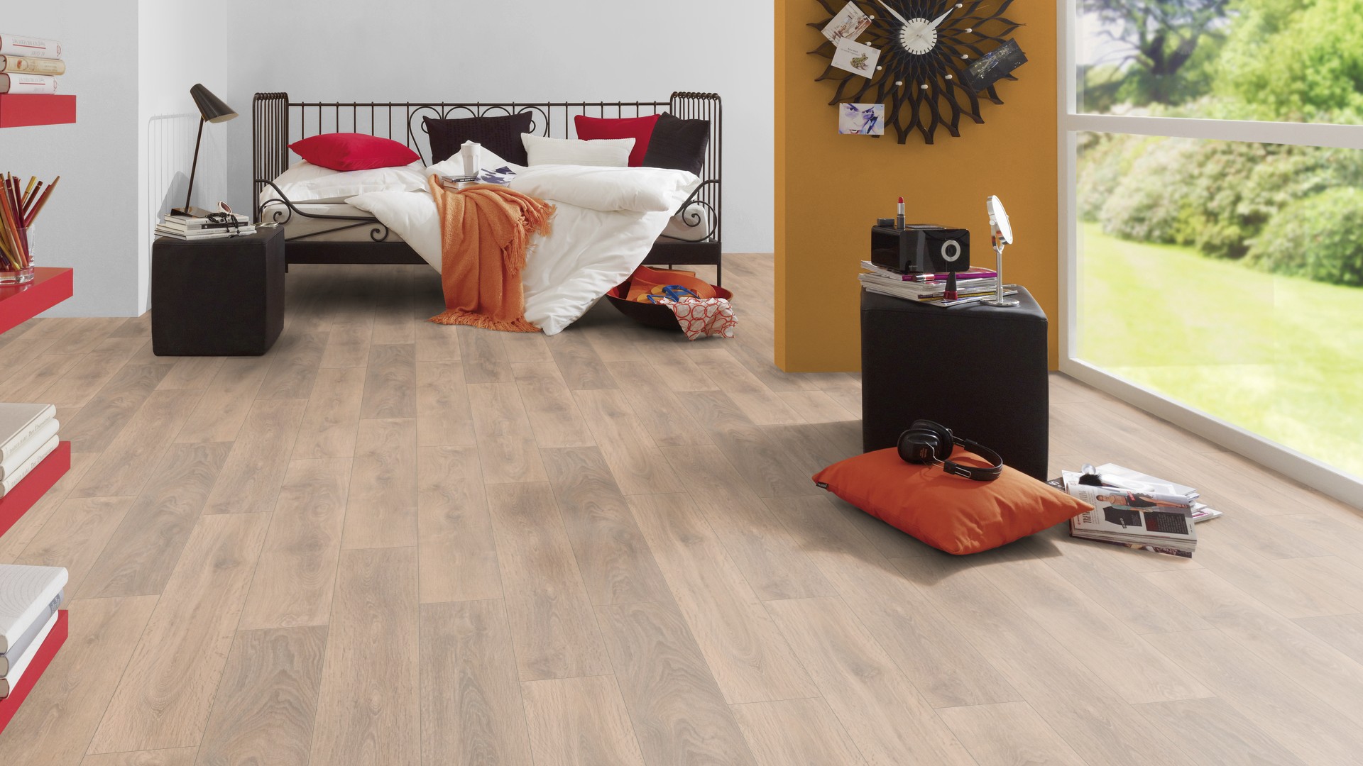 Blond Oak laminate flooring in bright living room with colorful decor – light oak creating cheerful, open atmosphere