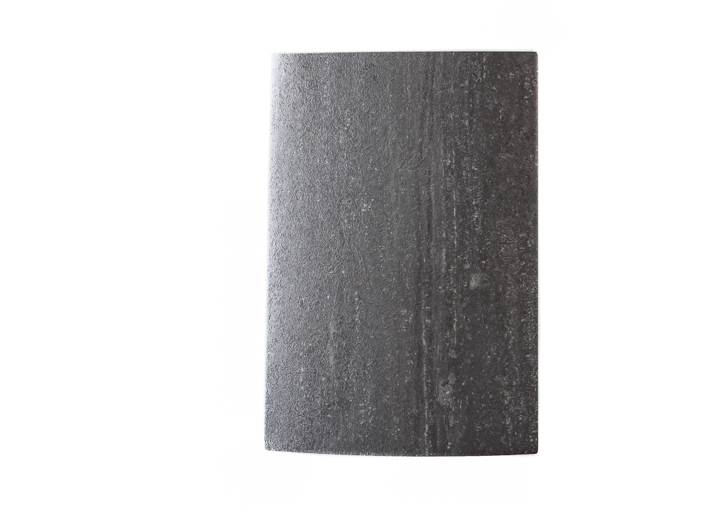 Close-up image of the K212 Dark Tivoli RS product, showcasing its deep color tones and distinct texture.