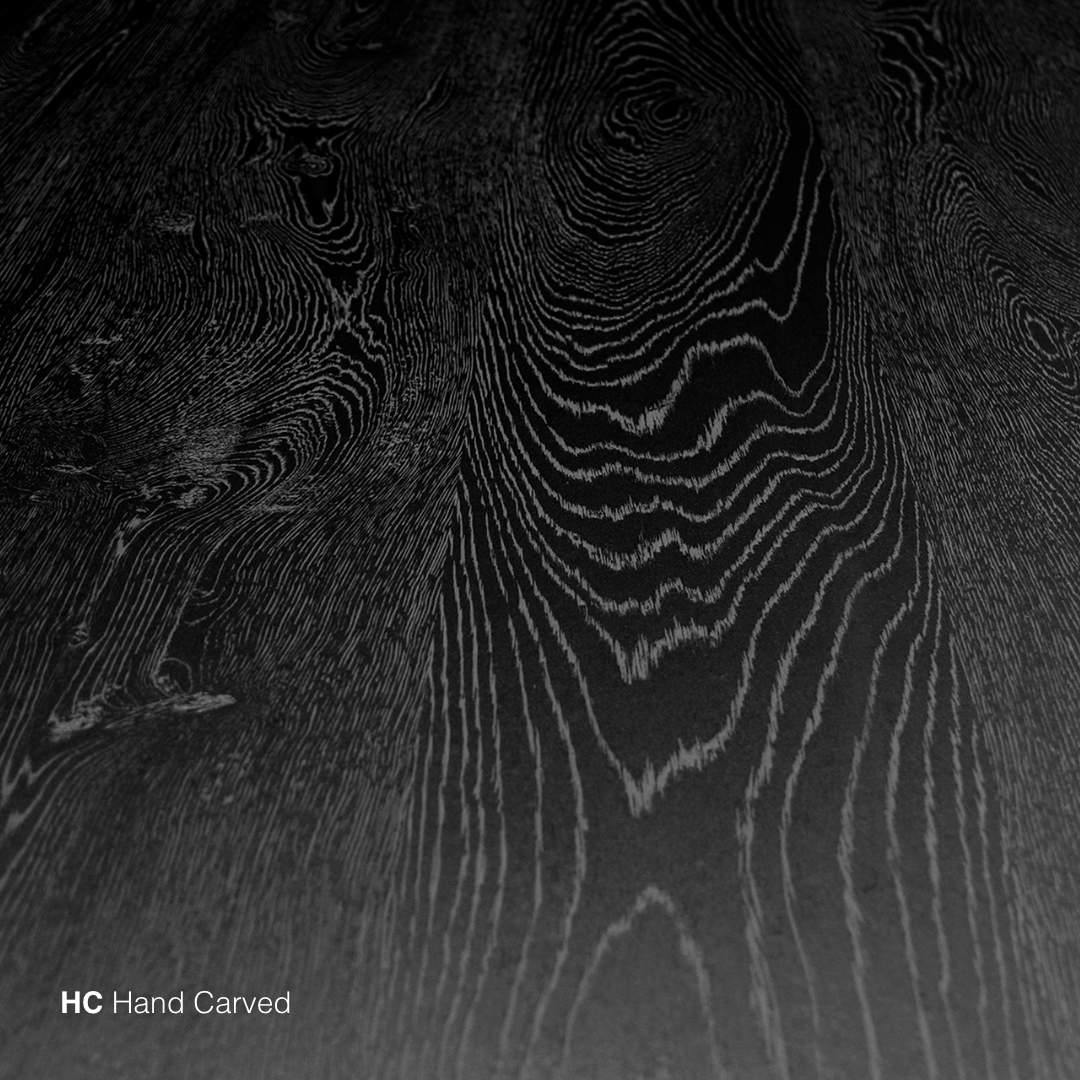 A black and white photo of Hand Carved Laminate Flooring.