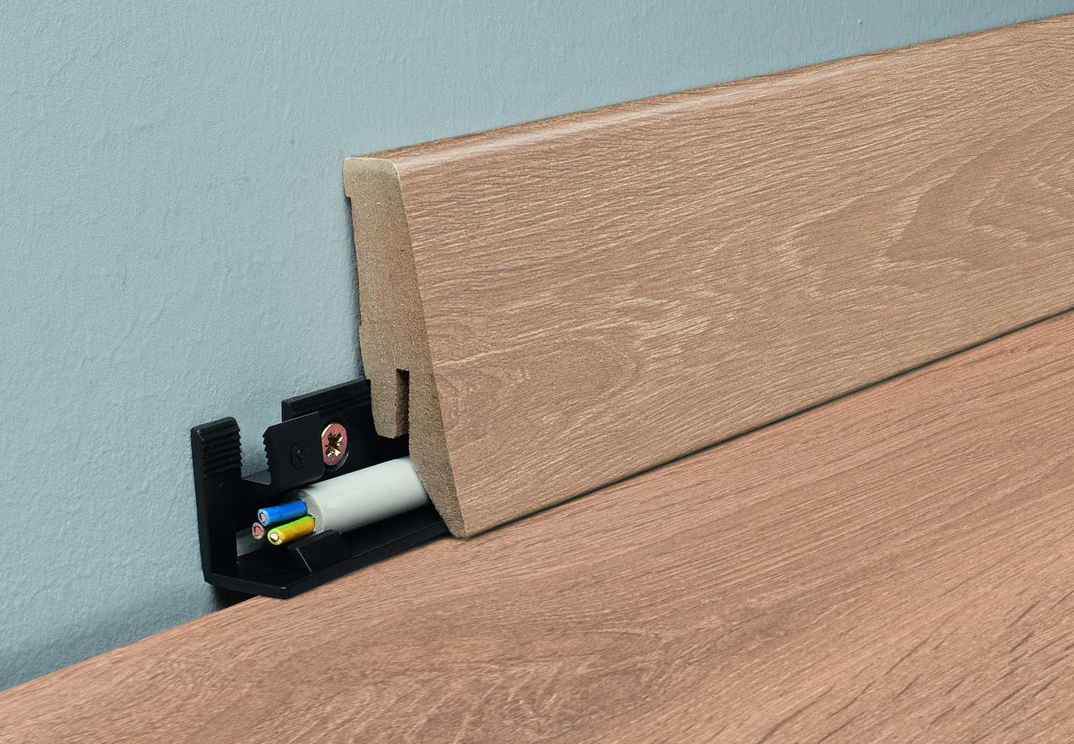 8634 MDF Skirting Board K58C-Orca, showcasing its textured surface and rich color.